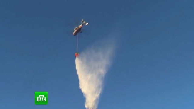 Военная авиация сбросила 200 тонн воды на очаги лесных пожаров в Сибири